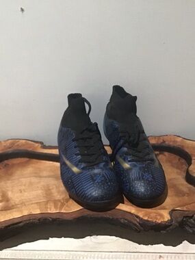 Nike Black Sneakers with Blue Heel Accents